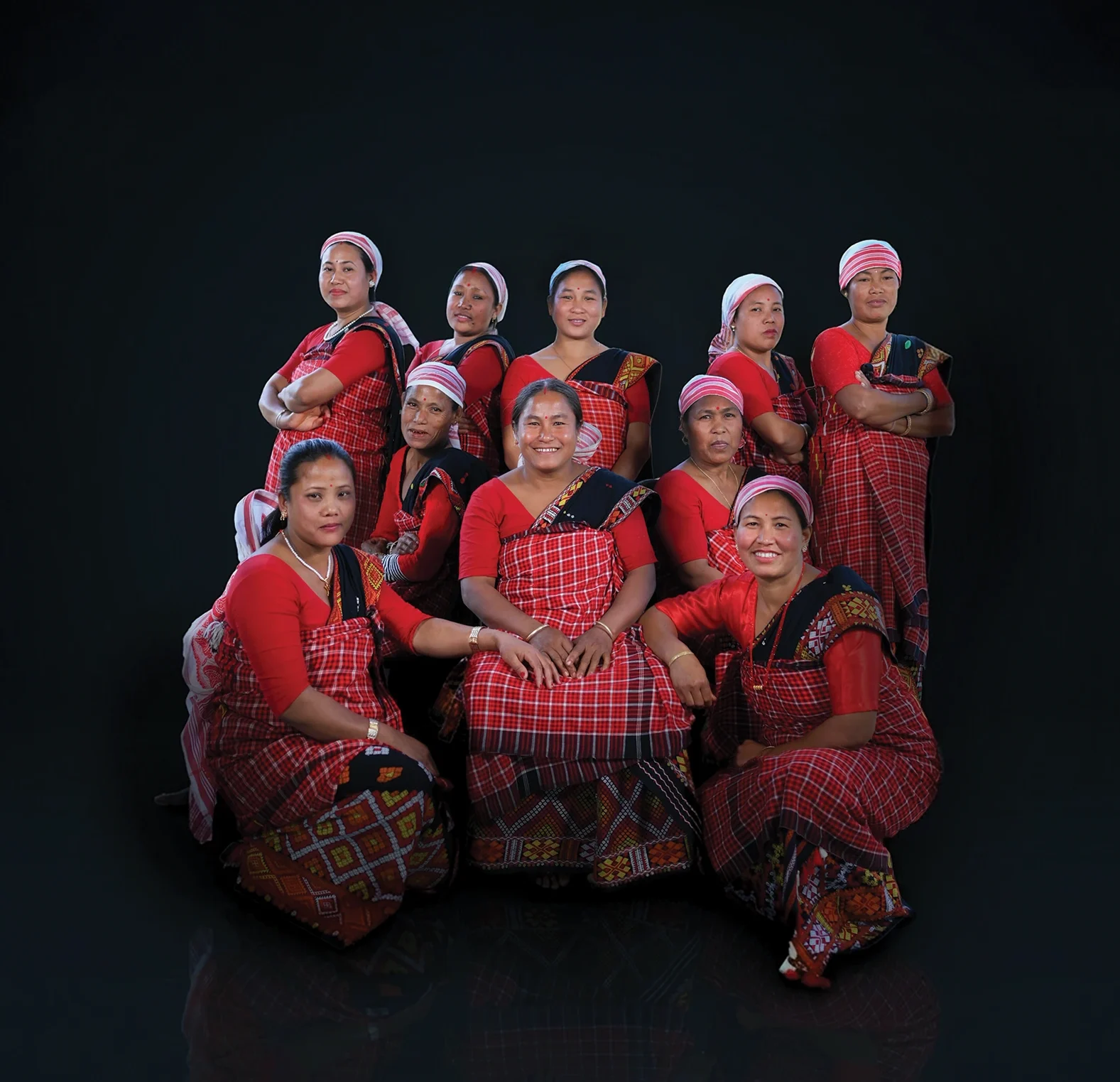 Women brewmasters of the village in traditional attire